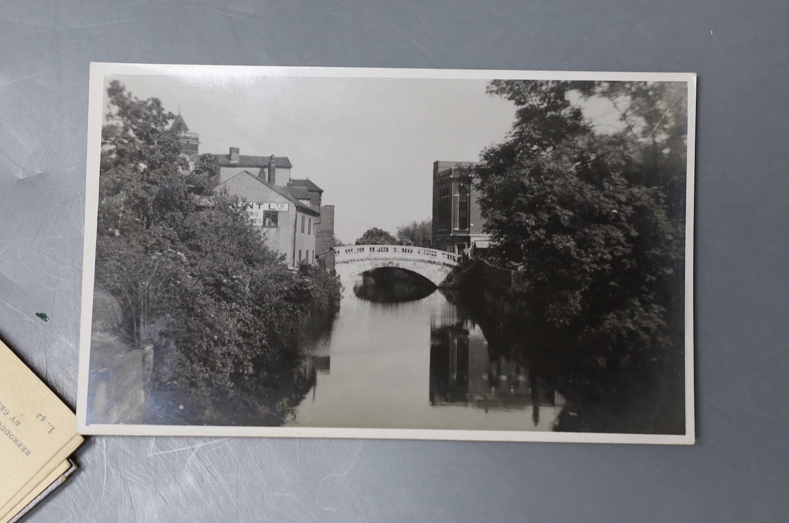 A collection of 20th century and later postcards including bi-plane, The British Museum, Sussex and others.